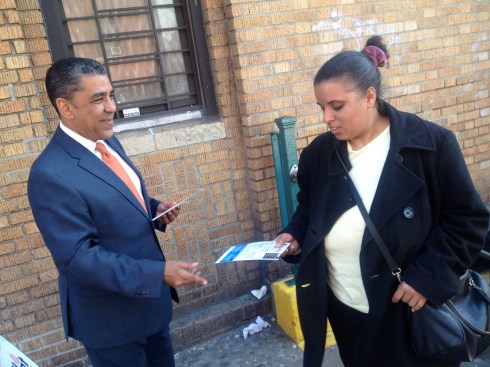 Adriano Espaillat campaigned outside the D-train station on East 196th Street and the Grand Concourse last month. Longtime congressman Charlie Rangel didn't accompany him at the BronxTalk debate today.