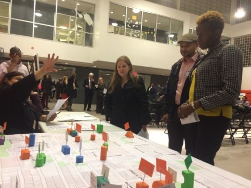 Mott Haven residents view proposed neighborhood upgrades at a meeting on Nov. 5. Photo by Maura Ewing/Mott Haven Herald