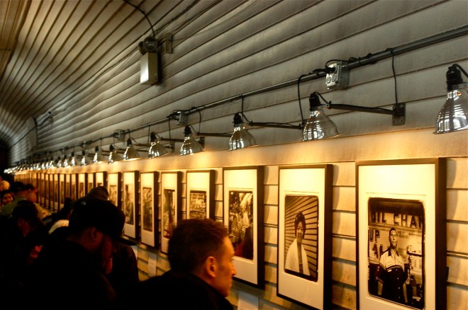 Vasquez Muffler was packed for the Workers Project photo exhibit opening on Oct. 3. Photo by Jordan Moss